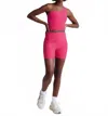 Beyond Yoga Keep Pace Biker Short In Vivid Pink Heather In Pink