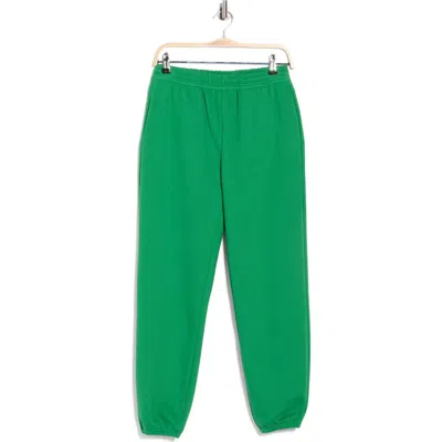 Beyond Yoga On The Go Cotton Blend Joggers In Green