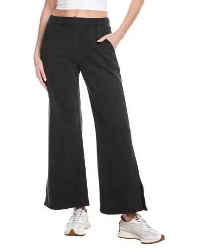 Beyond Yoga Open Ended Mid Rise Wide Leg Pant In Black