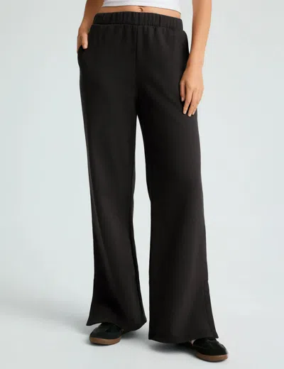 Beyond Yoga Open Ended Mid Rise Wide Leg Pant In Black