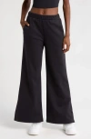 Beyond Yoga Open Ended Mid Rise Wide Leg Pants In Black