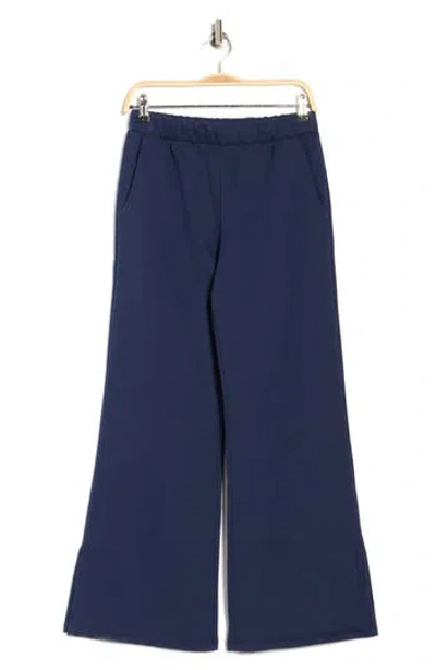 Beyond Yoga Open Ended Mid Rise Wide Leg Pants In Blue