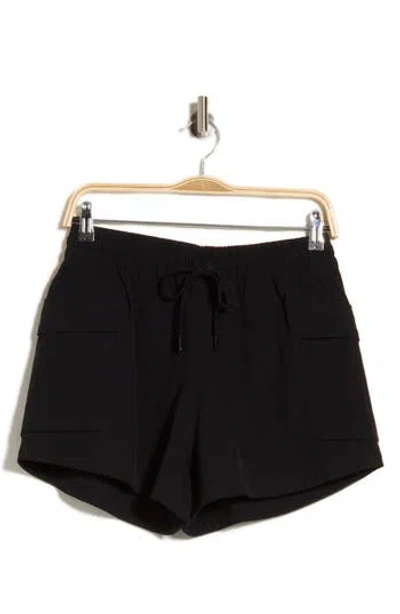 Beyond Yoga Peak 3-inch Cargo Shorts In Black