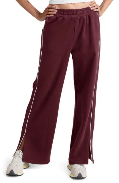 Beyond Yoga Piper Luxefleece Side Slit Wide Leg Pants In Burgundy