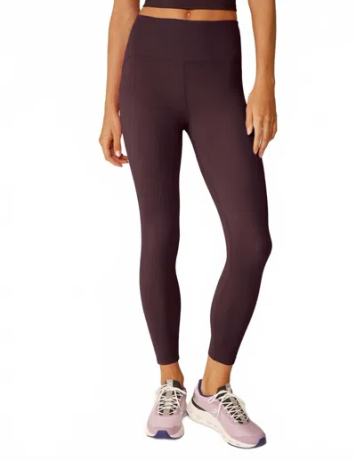 BEYOND YOGA POWERBEYOND MIDI LEGGING IN RICH PLUM