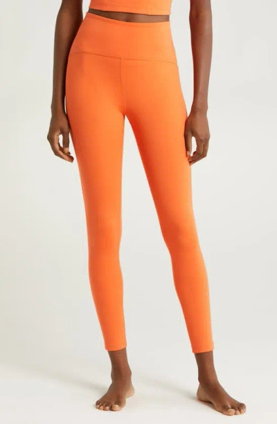 Beyond Yoga Powerbeyond™ Strive High Waisted Midi Leggings In Sunset Orange
