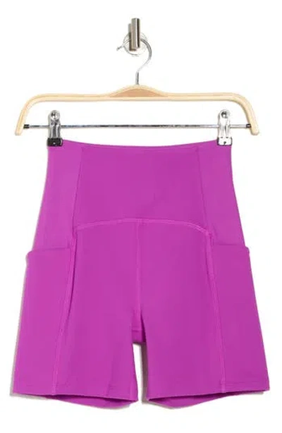 Beyond Yoga Powerbeyond™ Strive Pocket Bike Shorts In Violet Berry