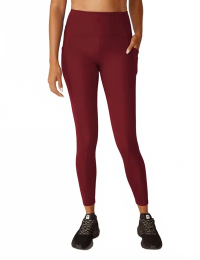 Beyond Yoga Powerbeyond Strive Pocket Midi Legging In California Merlot In Brown