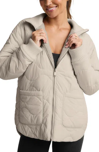 Beyond Yoga Roam Quilted Reversible Jacket In Neutral