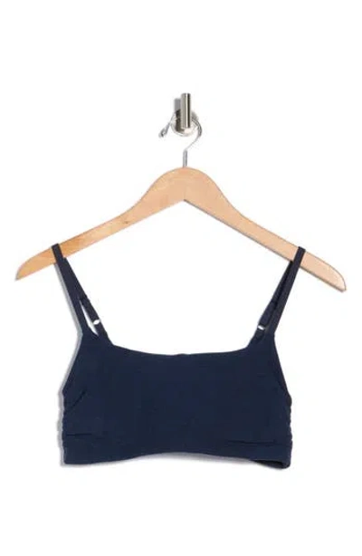 Beyond Yoga Space Dye Raise The Barre Shirred Sports Bra In Blue