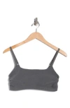 Beyond Yoga Space Dye Raise The Barre Shirred Sports Bra In Gray