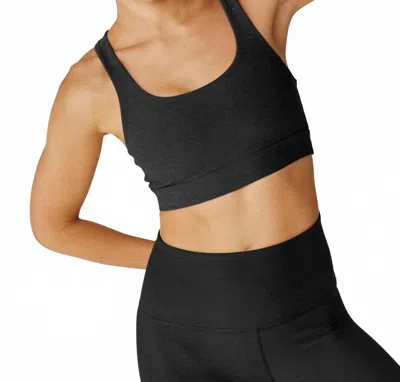 BEYOND YOGA SPACEDYE IN A TWIST SPORTS BRA IN DARKEST NIGHT