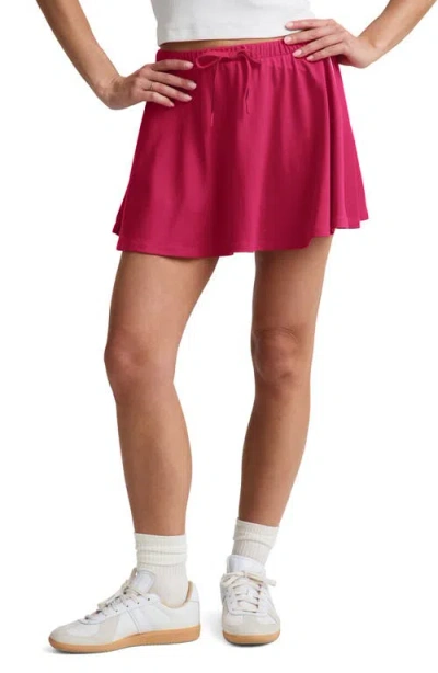 Beyond Yoga Sport Active Drawcord Miniskirt With Built-in Shorts In Pink