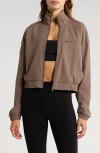 Beyond Yoga Status Pocket Sleeve Cropped Jacket In Dune