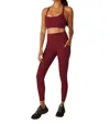 Beyond Yoga Strive Pocket Midi Legging In California Merlot In Multi