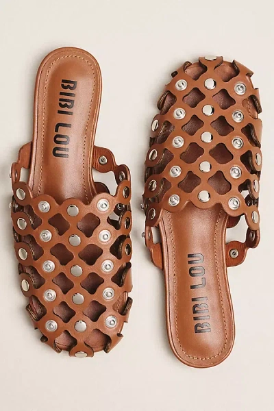 Bibi Lou Grommet Studded Mules In Brown
