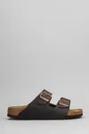 Birkenstock Arizona Birko-floor Sandals In Brown
