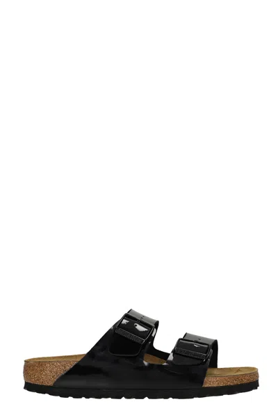 BIRKENSTOCK ARIZONA FLATS IN BLACK PATENT LEATHER