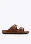 Birkenstock Arizona Two-strap Leather Slides In Brown