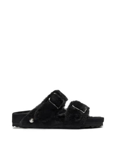BIRKENSTOCK BLACK SHEARLING SANDALS WITH OVERSIZED BUCKLES