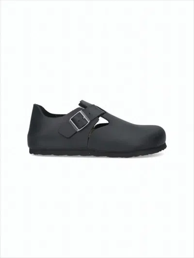 Birkenstock Closed-toe Sandals With Adjustable Buckle And Suede Lining In Black