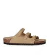 Birkenstock Triple Buckle Round Toe Flat Sandals In Brown