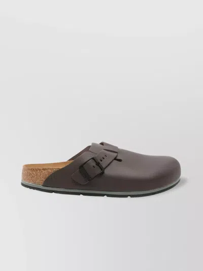 Birkenstock Leather Closed Toe Slippers With Textured Sole In Brown