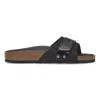 Birkenstock Oita Logo Embossed Leather Slides In Black