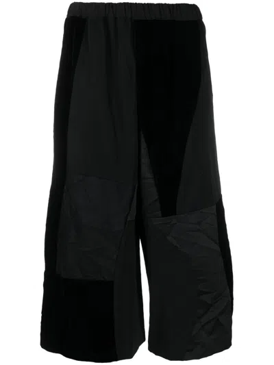 Black Comme Des Garçons Elasticated Cropped Trousers In Schwarz