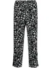 BLACK COMME DES GARÇONS HEART-PRINT CROPPED TROUSERS