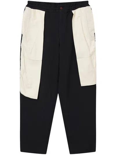 BLACK COMME DES GARÇONS PANEL-CONSTRUCTION TROUSERS