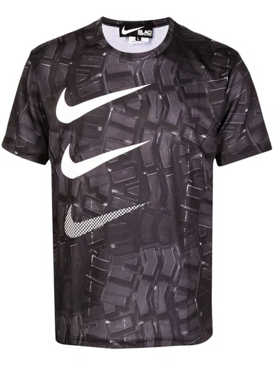 Black Comme Des Garçons Swoosh-print Graphic T-shirt In Black