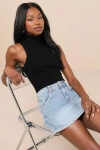 BLANKNYC EDGY SWEETNESS LIGHT WASH DENIM STUDDED MINI SKIRT