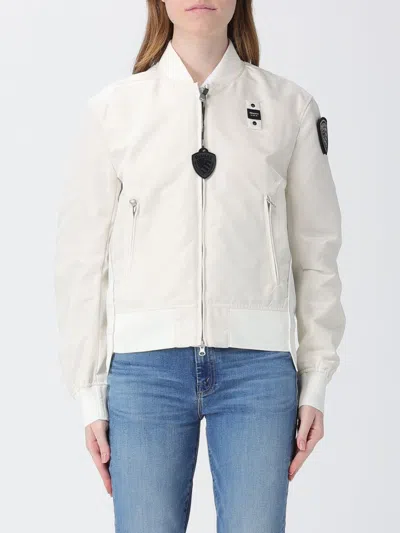 Blauer Coat Woman  In White