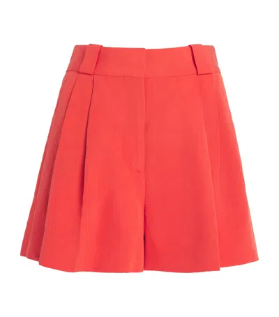 Blazé Milano Flica Selle Pleated Silk And Linen-blend Shorts In Orange