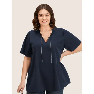 Bloomchic Solid Crisscross Notched Metal Decor Blouse In Blue