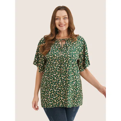 Bloomchic Women's Plus Size Ditsy Floral Ruffle Sleeve Tie Neck Blouse Armygreen Ditsy Floral Everyday Short S