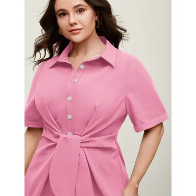 Bloomchic Women's Plus Size Knotted Front Asymmetrical Hem Blouse Peach Solid Office Short Sleeve Collared Nec In Orange