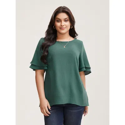 Bloomchic Women's Plus Size Solid Tiered Ruffles Split Hem Blouse Emerald Solid Elegant Half Sleeve Round Neck In Green