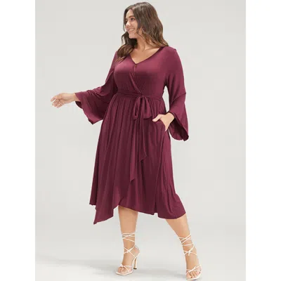 Bloomchic Women's Plus Size Solid Wrap Knotted Front Pocket Bell Sleeve Asymmetrical Hem Dress Burgundy Solid 