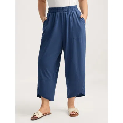 Bloomchic Women's Plus Size Stretchy Waist Asymmetrical Hem Straight-leg Pants Indigo Solid Straight Fit Mid R In Purple