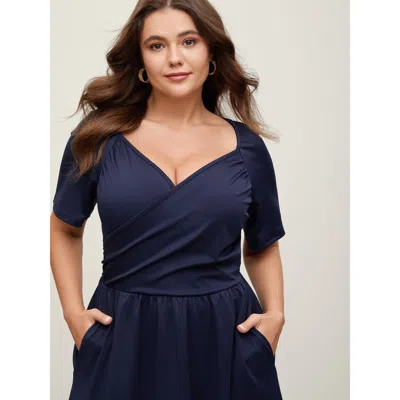 Bloomchic Women's Plus Size Stretchy Waist Overlap Pockets Midi Dress Indigo Solid Midi Office Ruched 30/6x In Purple