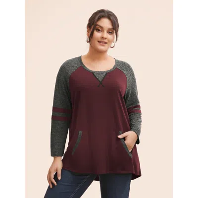 Bloomchic Women's Plus Size Striped Contrast Pocket Raglan Sleeve High Low Hem Sweatshirt Maroon Not Graphics  In Burgundy