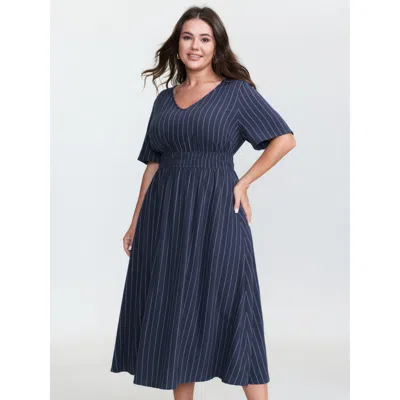 Bloomchic Women's Plus Size Striped V-neck Shirred Waist Midi Dress Indigo Stripes Midi Casual 12/l In Purple