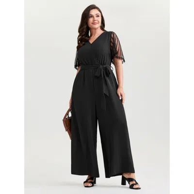 Bloomchic Women's Plus Size Textured Sheer Sleeve Stretchy Waist Tie Jumpsuit Black Elegant 10/m