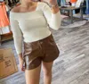 Blue Blush Asymmetrical Ribbed Sweater In Ivory