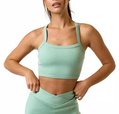 Blue Blush Stretch Scuba Crossed Back Tank Top In Green