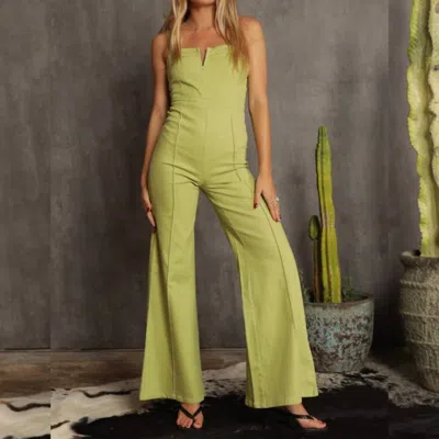 Blue Buttercup Denim V Neck Jumpsuit In Tea Leaf In Green