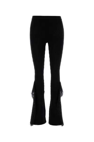 BLUMARINE BLUMARINE BLACK KNIT FLARED LEG PANT