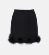 Blumarine Textured Knit Mini Skirt With Whimsical Fur Pom-poms In Black
